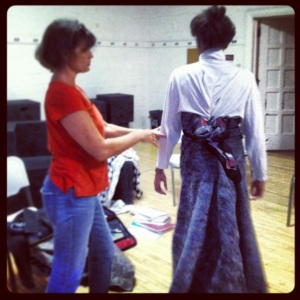 Steph Schroyer improvising a Victorian gown on her model, Amaka.